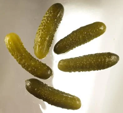 Solted cucumbers Stock Photos