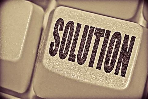 Solution concept with computer key on keyboard Stock Photos