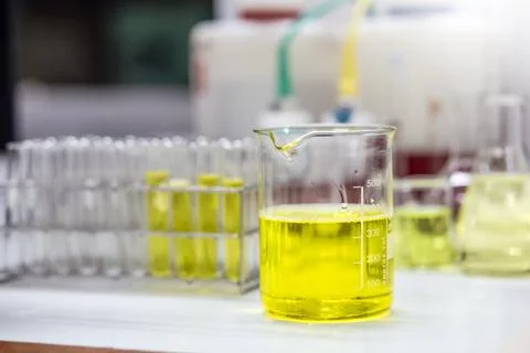 The solution of an emulsifier in a beaker for formulation test of the cosme.. Stock Photos