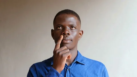 Solution, eureka - young black  man reflecting and finding the solution Stock Footage 136542136