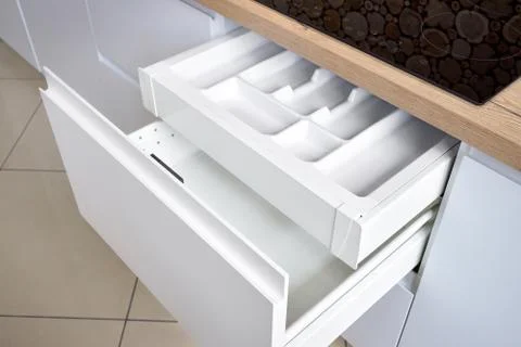 Solution for placing kitchen utensils in modern kitchen - horizontal sliding Stock Photos