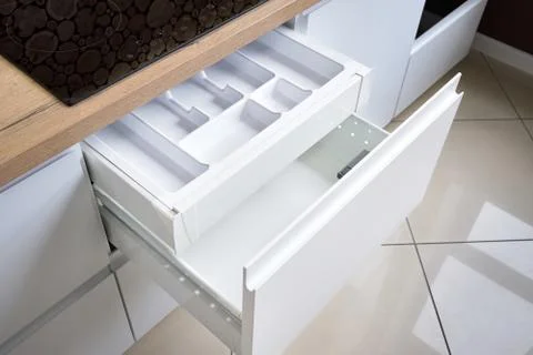 Solution for placing kitchen utensils in modern kitchen - horizontal sliding Stock Photos