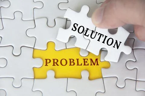 Solution to a problem text on jigsaw puzzle. Problem solving concept Foto stock