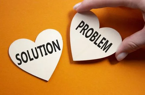 Solution vs Problem symbol. Concept word Solution vs Problem on wooden hear.. 写真素材