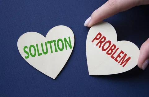 Solution vs Problem symbol. Concept word Solution vs Problem on wooden hear.. 写真素材