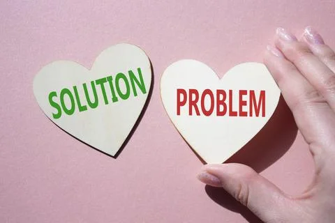 Solution vs Problem symbol. Concept word Solution vs Problem on wooden hear.. Stock Photos
