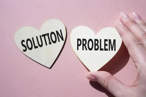 Solution vs Problem symbol. Concept word Solution vs Problem on wooden hear.. Stock Photos
