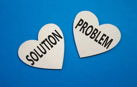 Solution vs Problem symbol. Concept word Solution vs Problem on wooden hear.. 写真素材