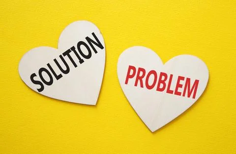 Solution vs Problem symbol. Concept word Solution vs Problem on wooden hear.. Foto stock