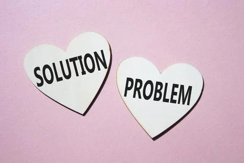 Solution vs Problem symbol. Concept word Solution vs Problem on wooden hear.. 写真素材