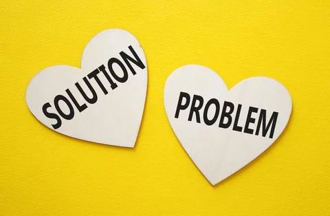 Solution vs Problem symbol. Concept word Solution vs Problem on wooden hear.. 스톡 사진