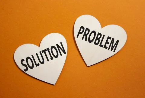 Solution vs Problem symbol. Concept word Solution vs Problem on wooden hear.. 스톡 사진