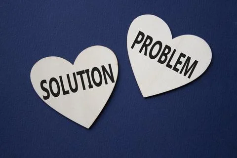 Solution vs Problem symbol. Concept word Solution vs Problem on wooden hear.. 스톡 사진