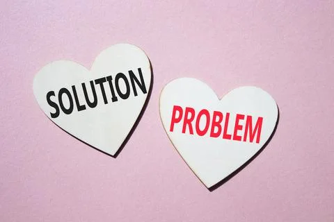 Solution vs Problem symbol. Concept word Solution vs Problem on wooden hear.. 스톡 사진