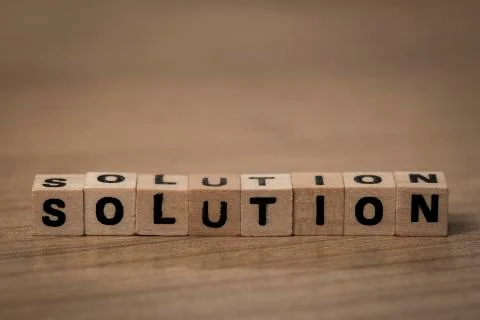 Solution in wooden cubes Stock Photos