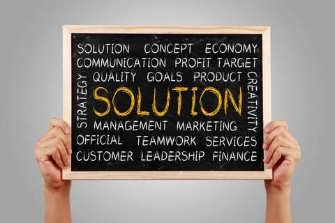 Solution Word Cloud Hands are holding the blackboard of Solution word clou... Stock Photos