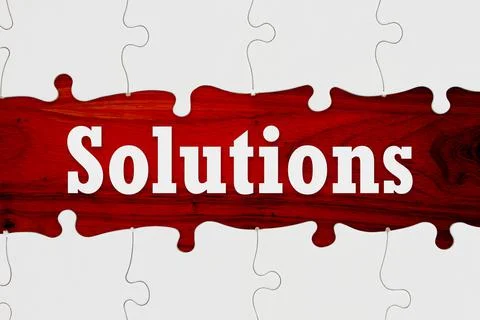 Solutions message in a white puzzle border with red area Foto stock
