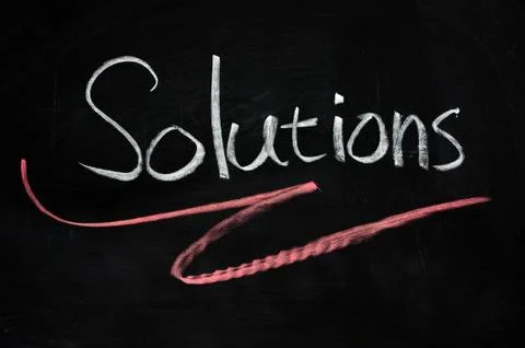 Solutions written on blackboard 스톡 사진