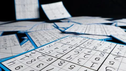 Solved sudoku puzzles representing logic and strategy games Stock Photos