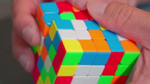 Solving 5x5 Speedcube Puzzle Close Up 4K Stock Footage 340179104