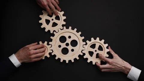 Solving the problem concept - puzzles and cogwheels. Stockfoto's