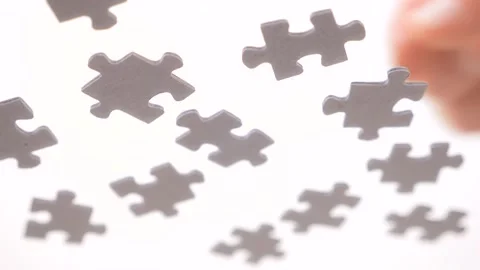 Solving a problem. Dealing with complicated task. Oddly shaped interlocking and Stock Footage 132986783