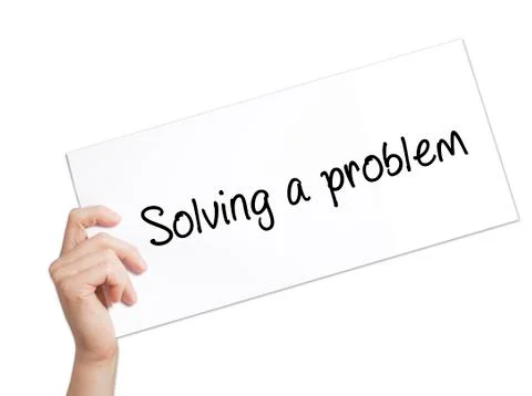 Solving a problem Sign on white paper. Man Hand Holding Paper with text. Isol Foto stock