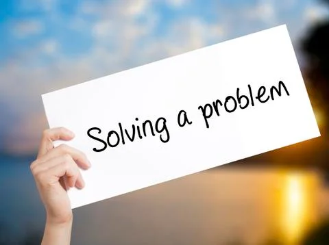 Solving a problem Sign on white paper. Man Hand Holding Paper with text. Isol Foto stock