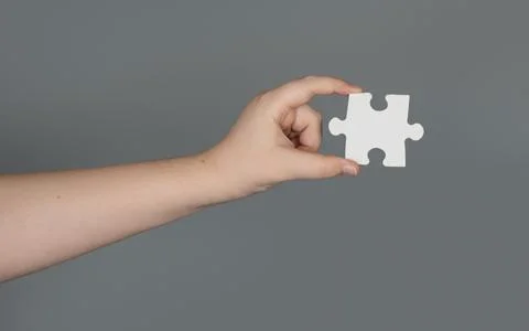 Solving problem starts with single puzzle. Solving concept shows logical Stock Photos
