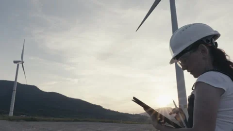 Solving problems and problems with wind turbine. Analysis breakdowns and Stock Footage 246178085
