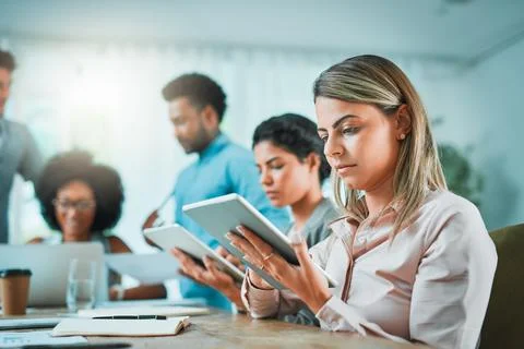 Solving problems with one design at a time. young designers working in a modern Foto stock