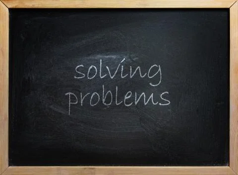 Solving Problems Text On School Board Stockfoto's