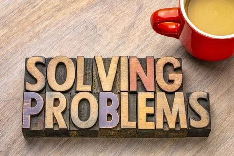 Solving problems text in wood type solving problems word abstract in vinta... Stock Photos