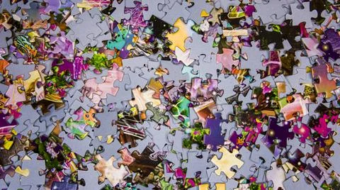 Solving a puzzle, a board game Stock Photos