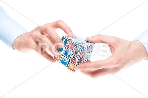 Solving rubick's cube with social media logos Stock Illustration