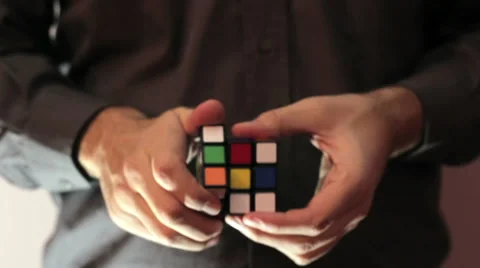 Solving Rubik Cube Puzzle  Warm Look Stock-Footage 38707449