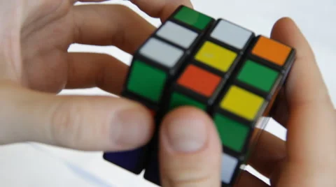 Solving Rubik's Cube puzzle Stock Footage 49931359