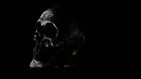 Somber Macabre Skull of Terror and Shadow Stock Footage 10849628