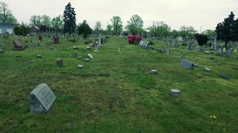 Somber Walk through a Cemetery Stock Footage 62932005