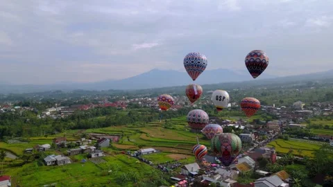 Some beautifully colored balloons at Wonosobo hot air balloon festival in Stock Footage 241308237