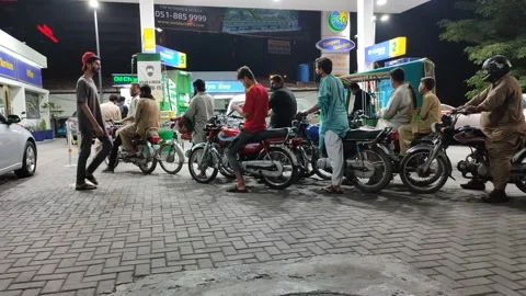 Some bikes are in line for refueling in PSO Petrol Station Stock Footage 161271717