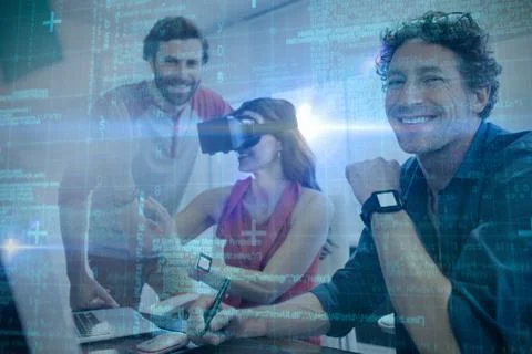 Some Blue matrix and codes against colleagues using technology Stockfoto's