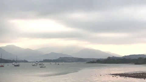 Some boats on the lake, cloud and mountain Video stock 75720347