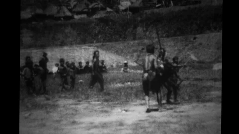 Some Bontoc Igorot men demonstrate fight Stock Footage 90411040