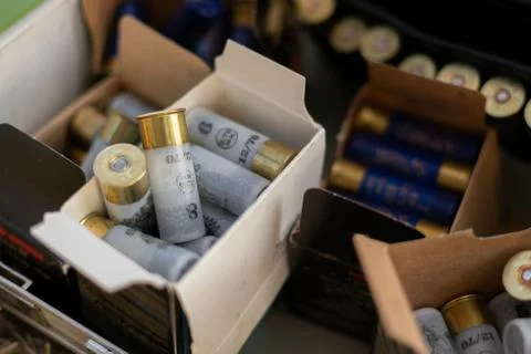 Some boxes storage with hunting bullets ammunition for animal rifles Stock Photos