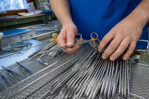 Some Cleaned surgical instruments are sorted into an instrument tray Stock Photos