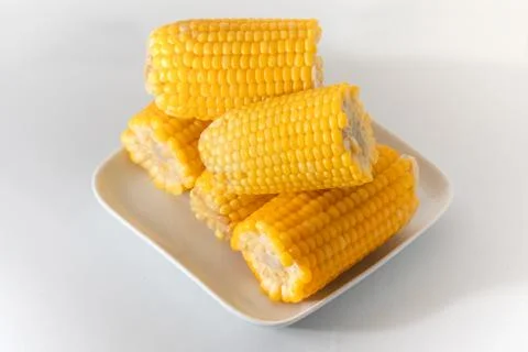 Some corn cooked very soft, hot and yellow. Stock Photos