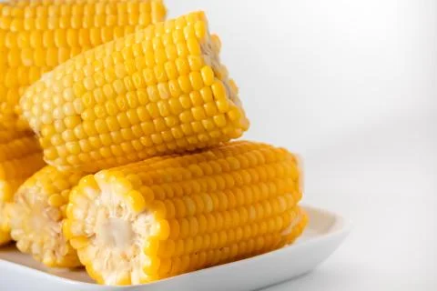 Some corn cooked very soft, hot and yellow. Stock Photos
