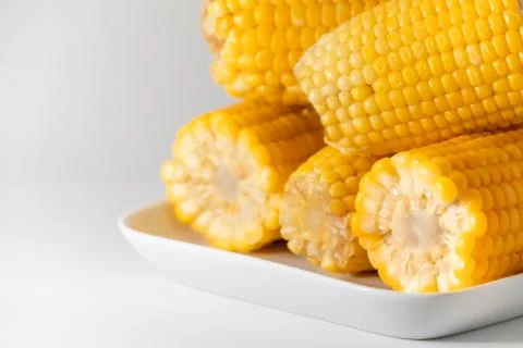 Some corn cooked very soft, hot and yellow. Stock Photos