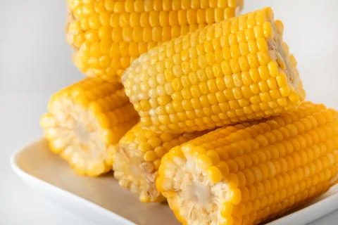 Some corn cooked very soft, hot and yellow. Stock Photos